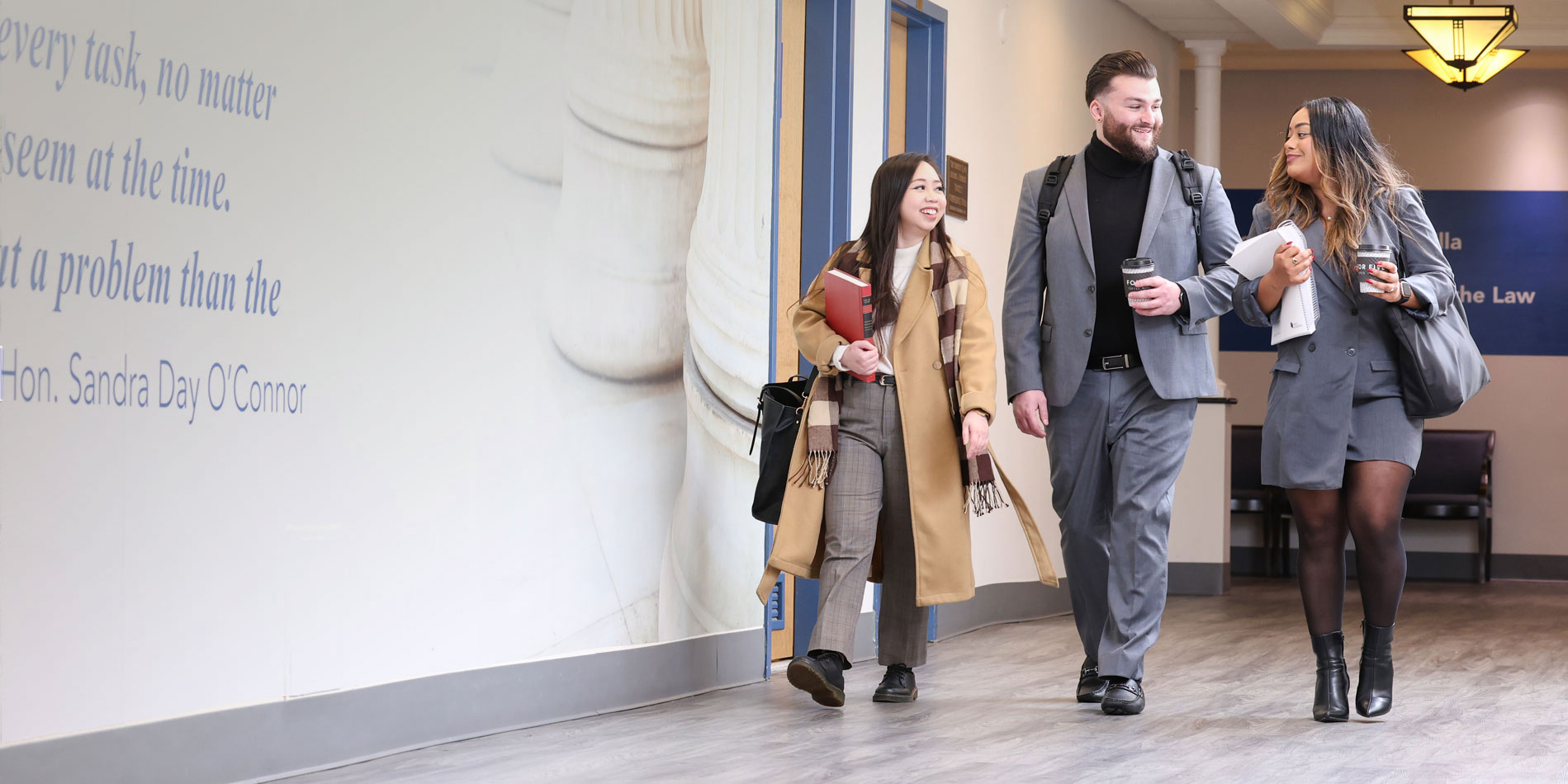 Three Hofstra Law students in the Maurice A. Deane School of Law on Long Island in NY